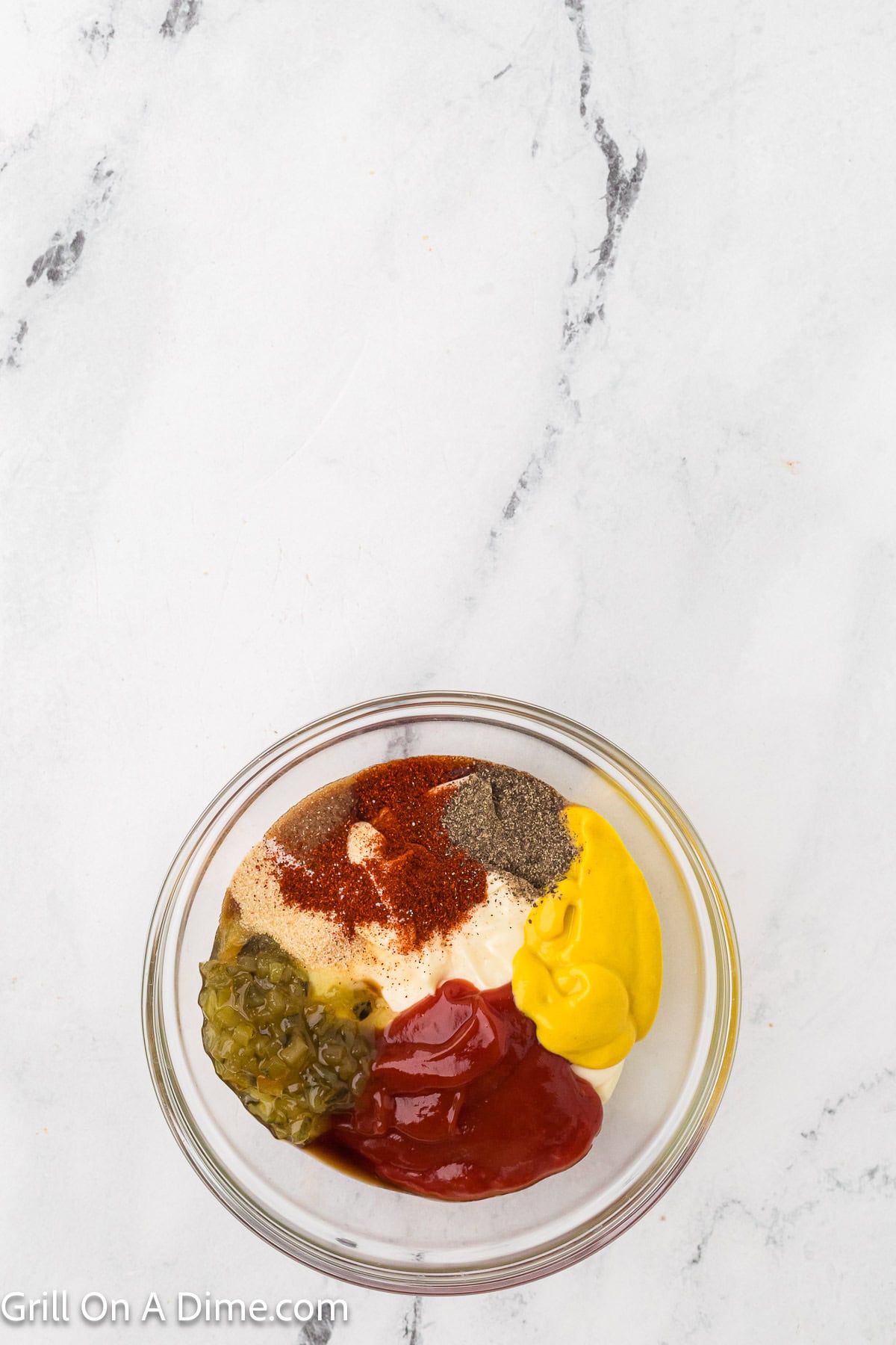 Adding ingredients to the bowl