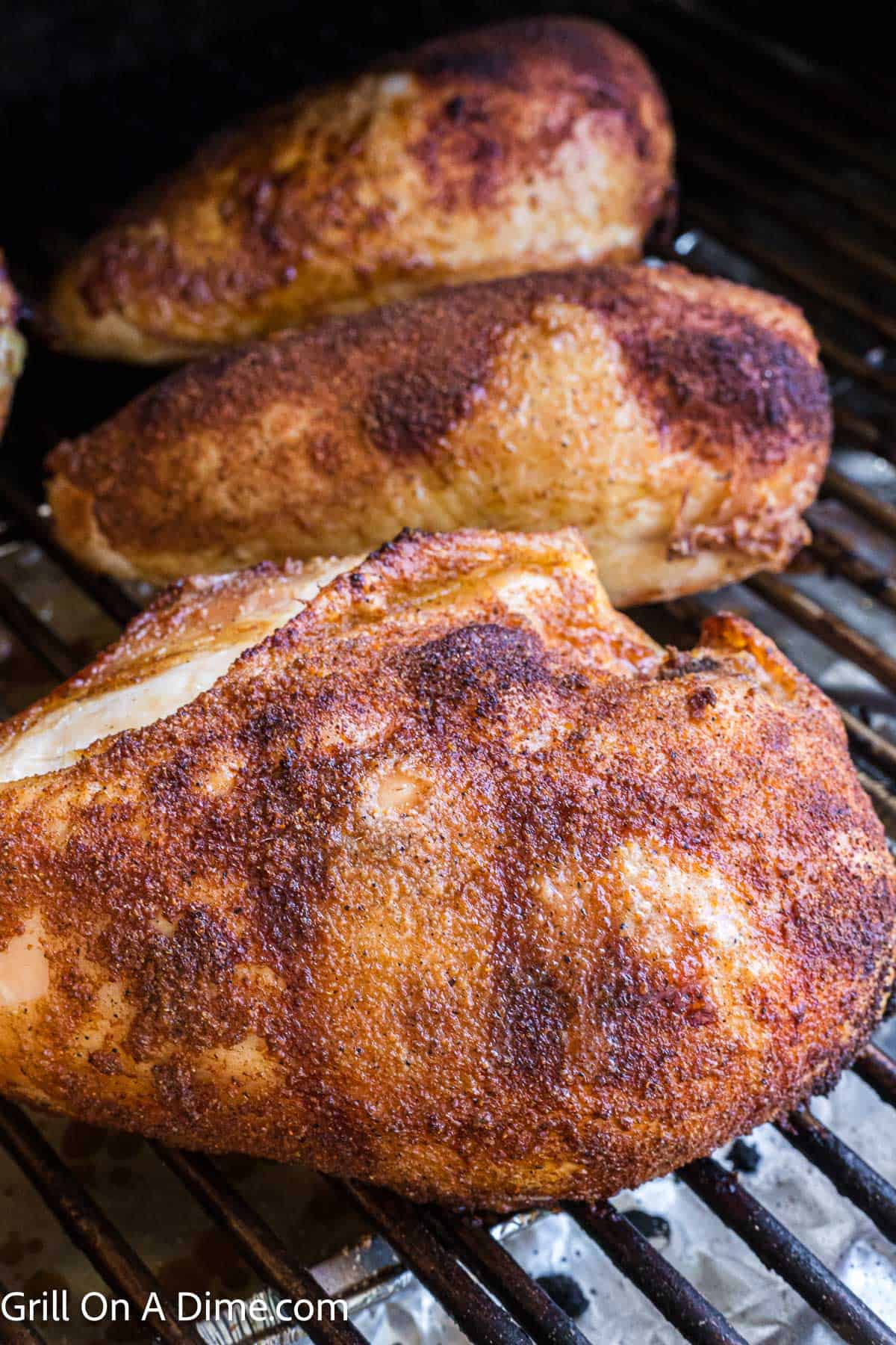 Smoked chicken breast in the smoker