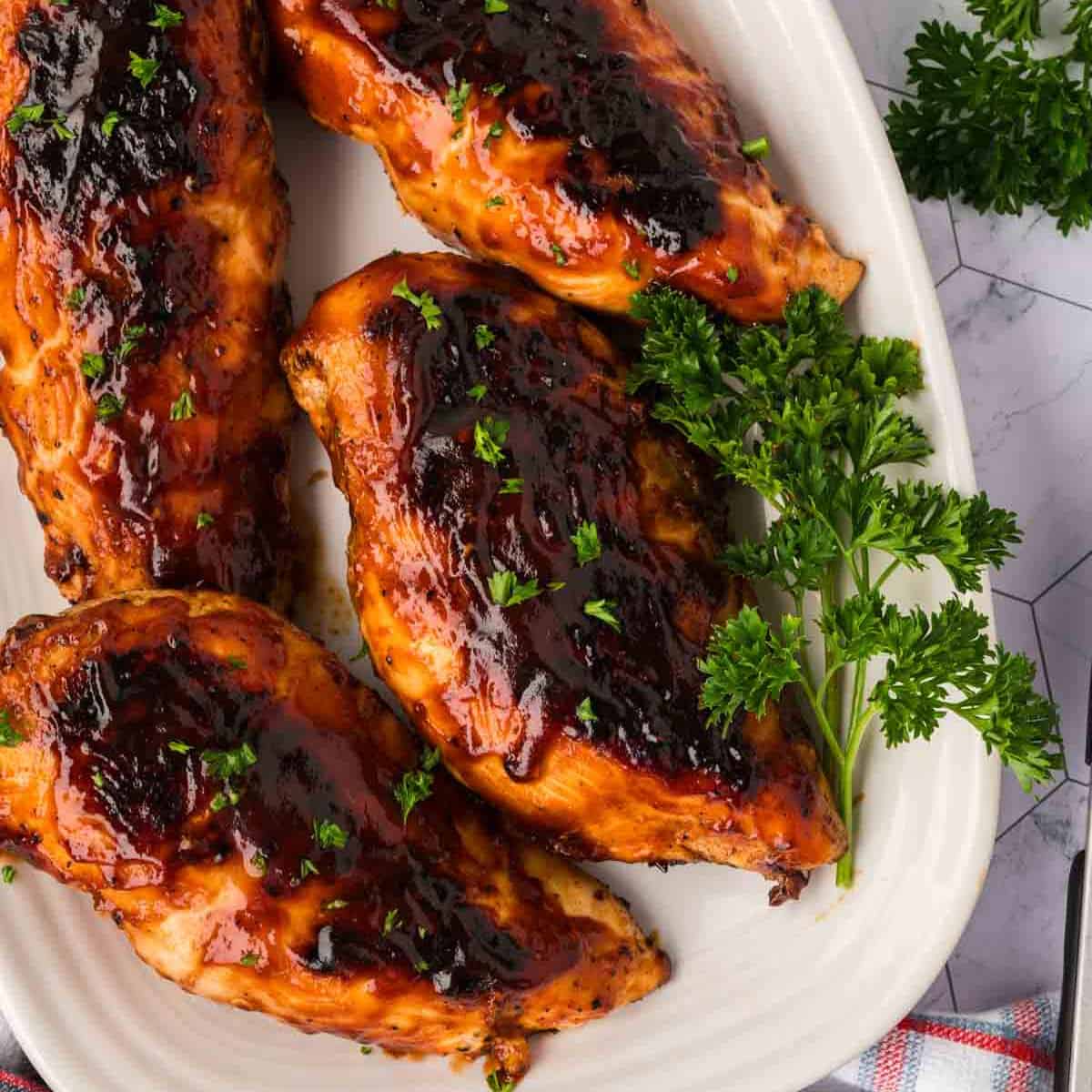 BBQ Chicken Breast on a white platter