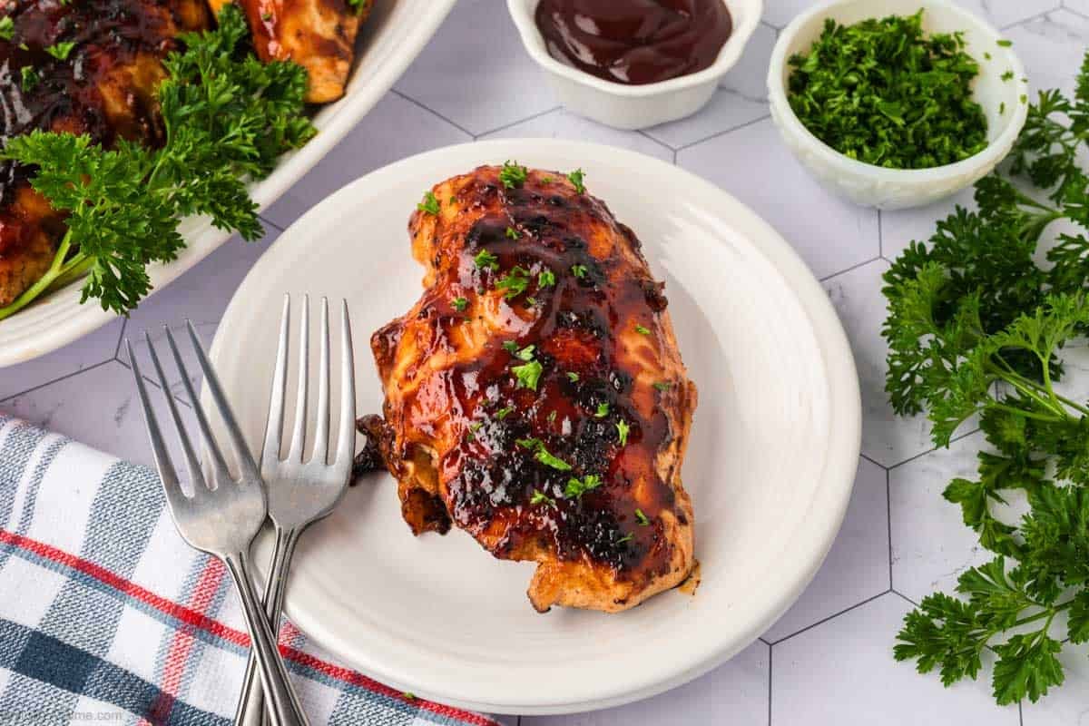 A serving of BBQ Chicken on a plate