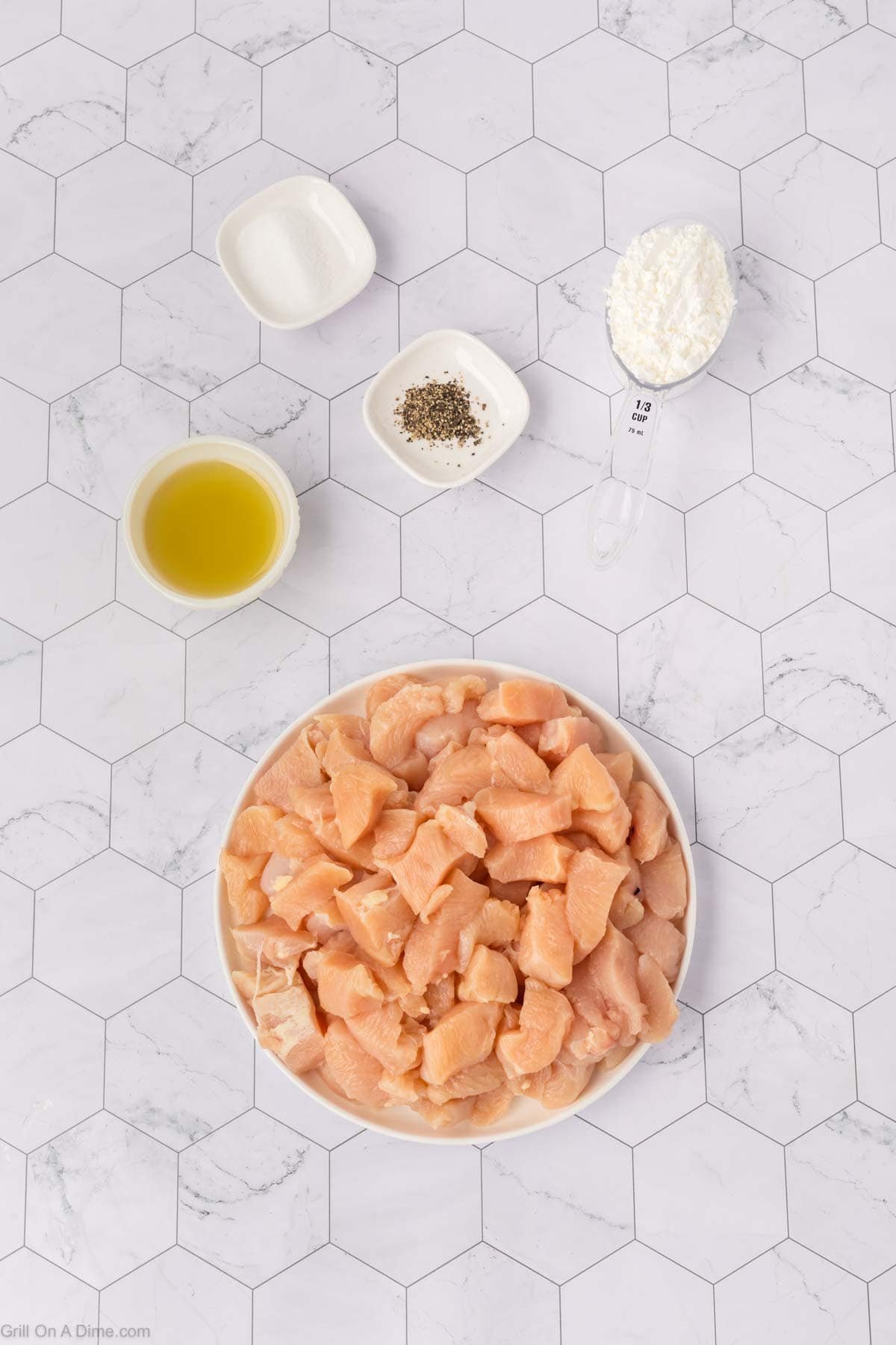 Ingredients - Dice chicken, salt, pepper, oil and cornstarch