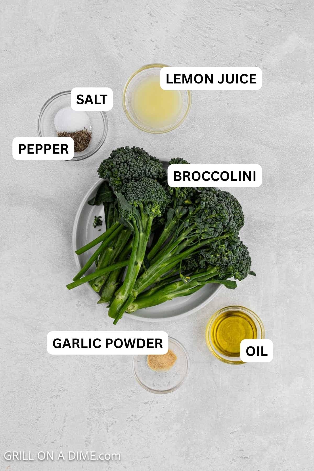 Ingredients need to make this recipe which includes broccolini, lemon juice, salt, pepper, garlic powder, and oil.