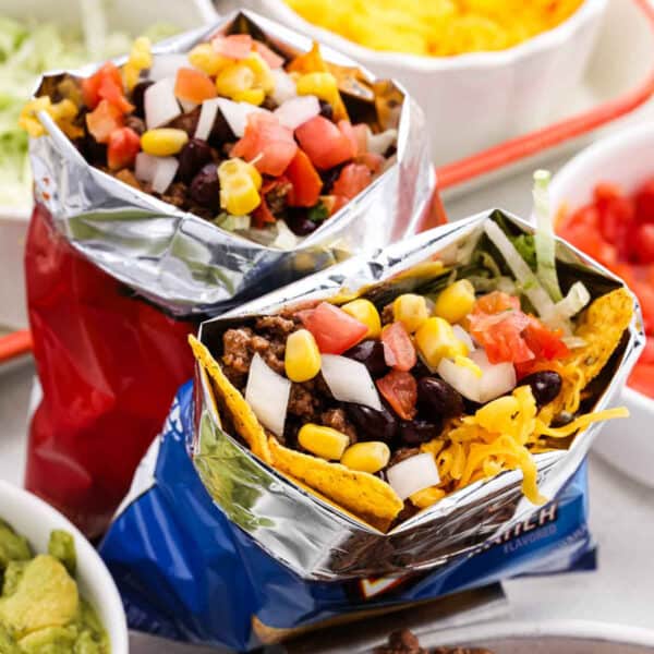 2 walking tacos loaded with chips, ground beef, corn salsa and shredded cheese.